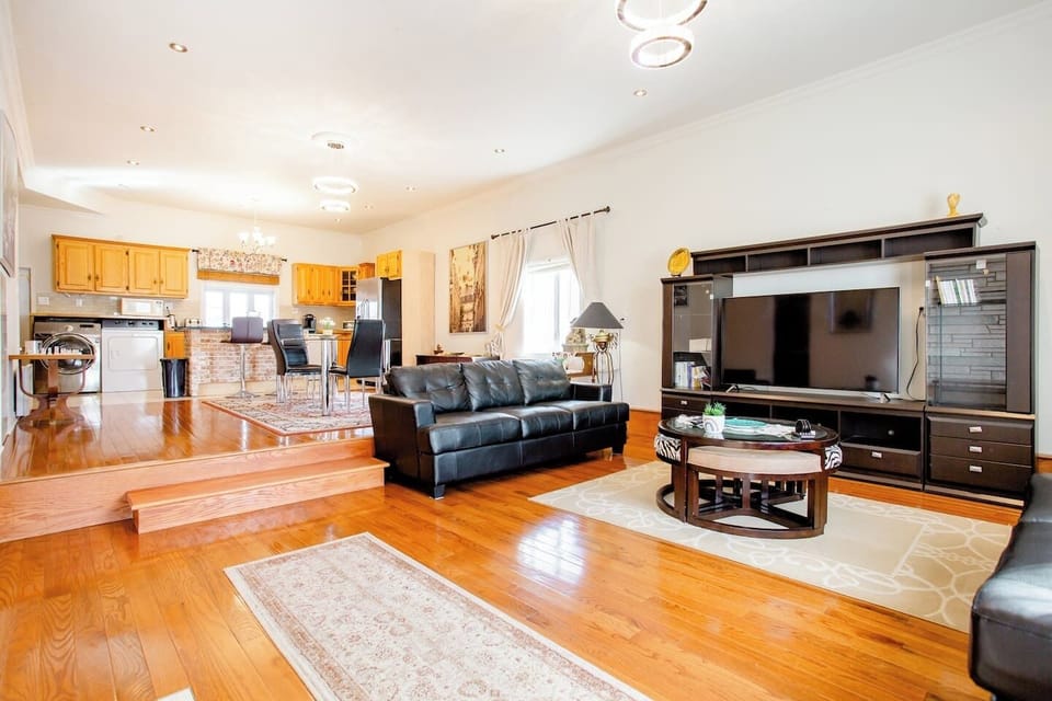 Living room area with 60" smart TV