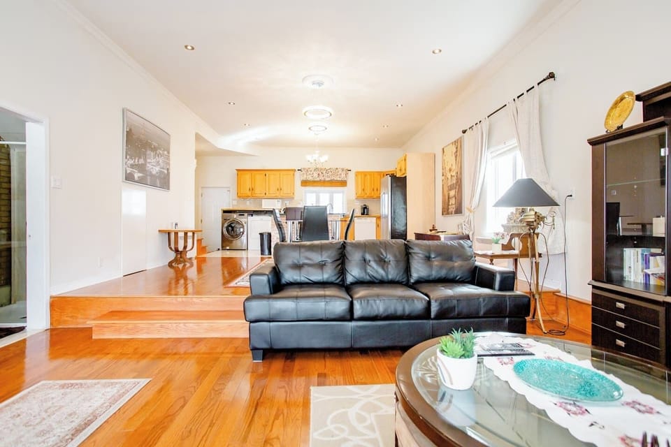 Living room area with 60" smart TV