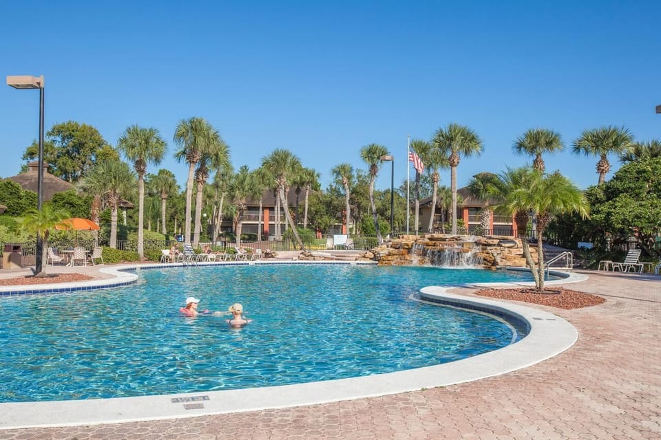 Dive into the sparkling resort pool and soak up sunshine.