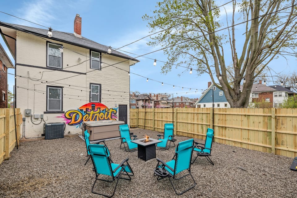 Bold design + fire pit & hot tub hangouts in Detroit