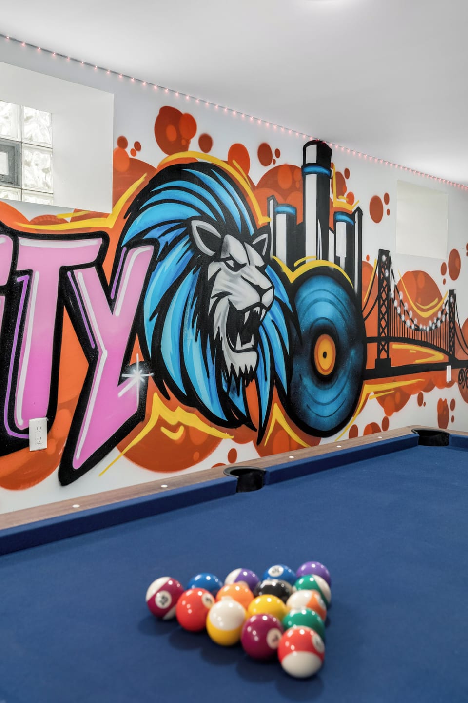 Bold Detroit mural sets the vibe for epic game room battles