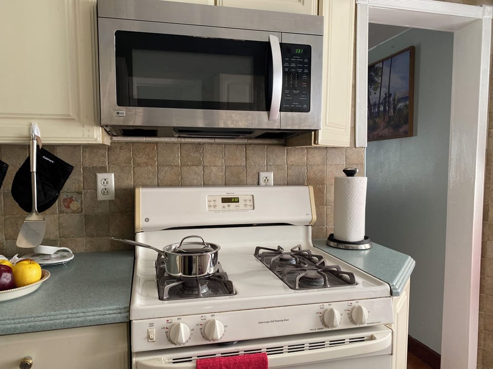 Stove, microwave pots and pans available
