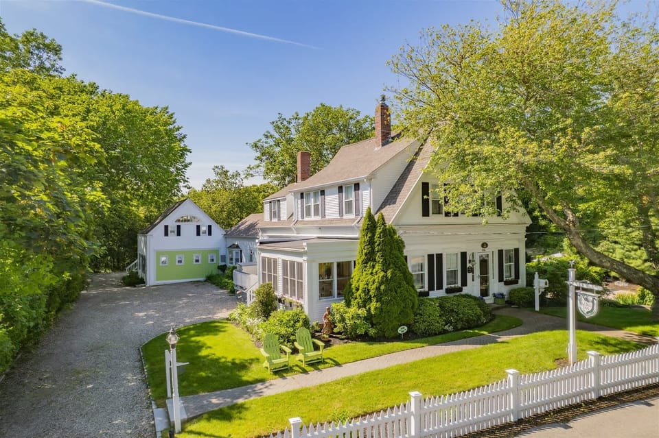 Classic Centerville Cape Cod vacation rental with an attached guest house and generous parking, offering an easy, stress-free arrival for large groups.