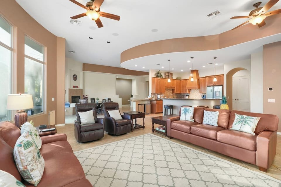 Open living space seamlessly connecting the living room, kitchen, and dining area