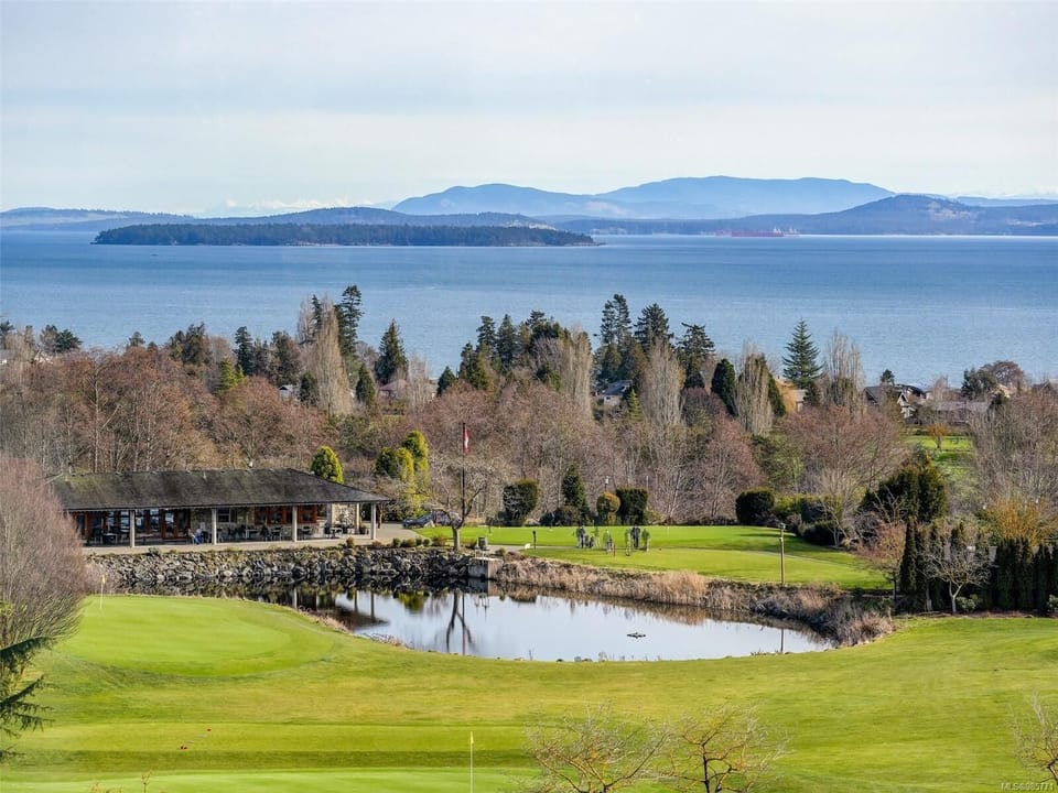 Steps from the Lochside Trail and sandy beaches below.