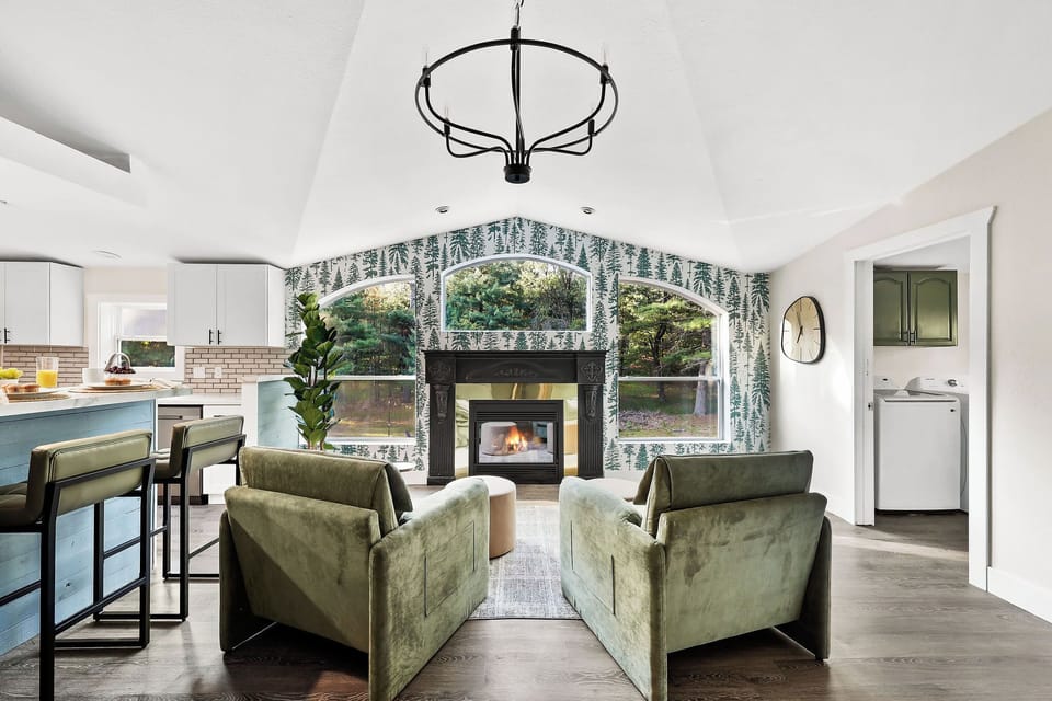 Our favorite room for morning coffee and serene views by the fireplace