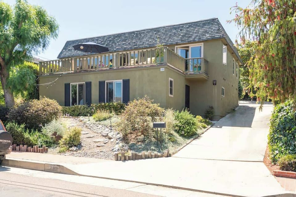 You can see the door in the right-center of the photo, and the area below the deck is where the flat is located. There is no access to the deck for our guests. 