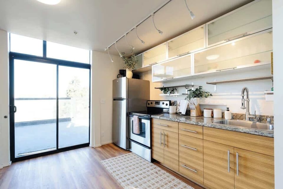 Compact yet fully equipped! Our galley kitchen makes cooking a joy with each access to the deck!
