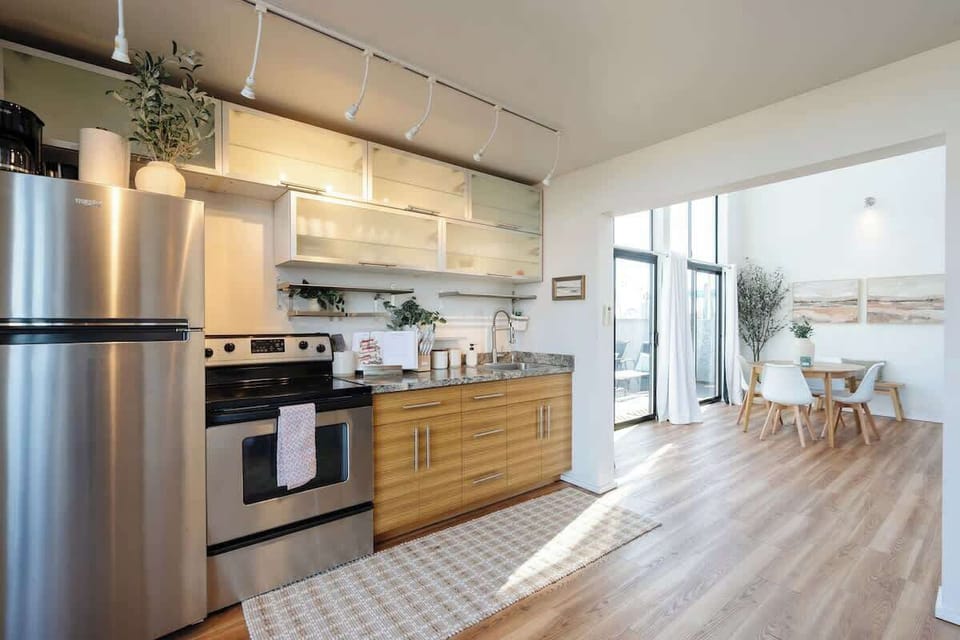 Whip up delights in our stylish galley kitchen—where function meets elegance!

