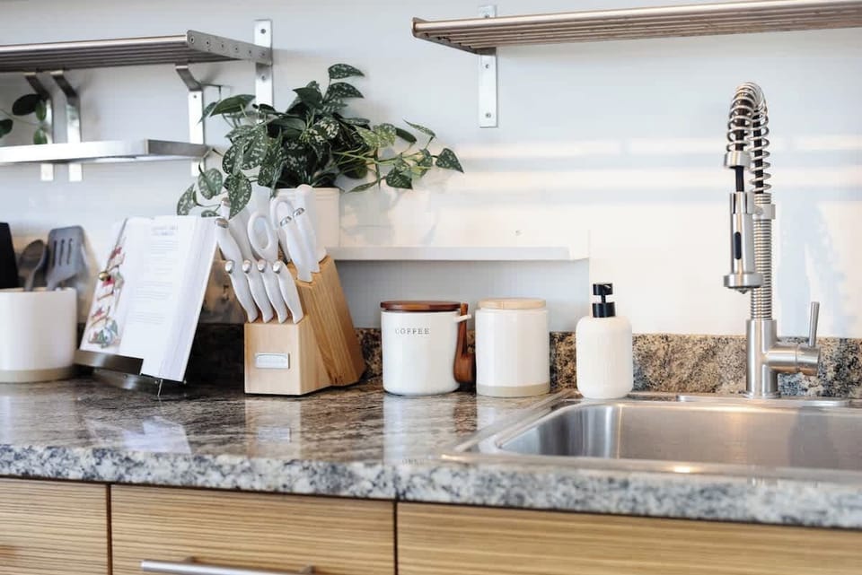 Embrace culinary adventures in our sleek and efficient galley kitchen.
