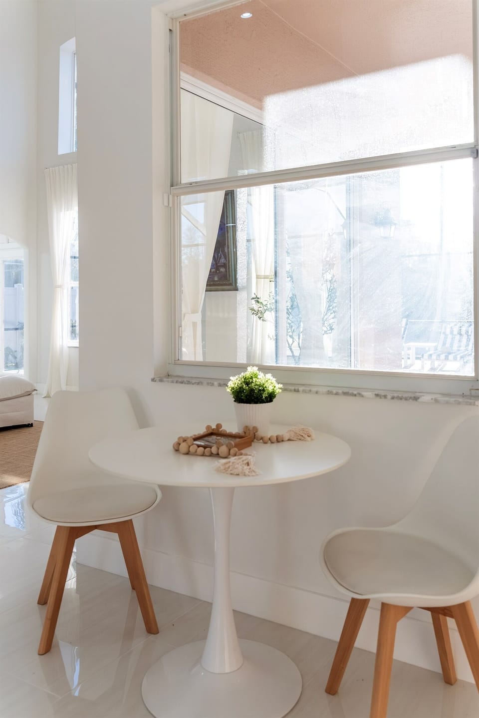Bistro table for two with peaceful pool views
