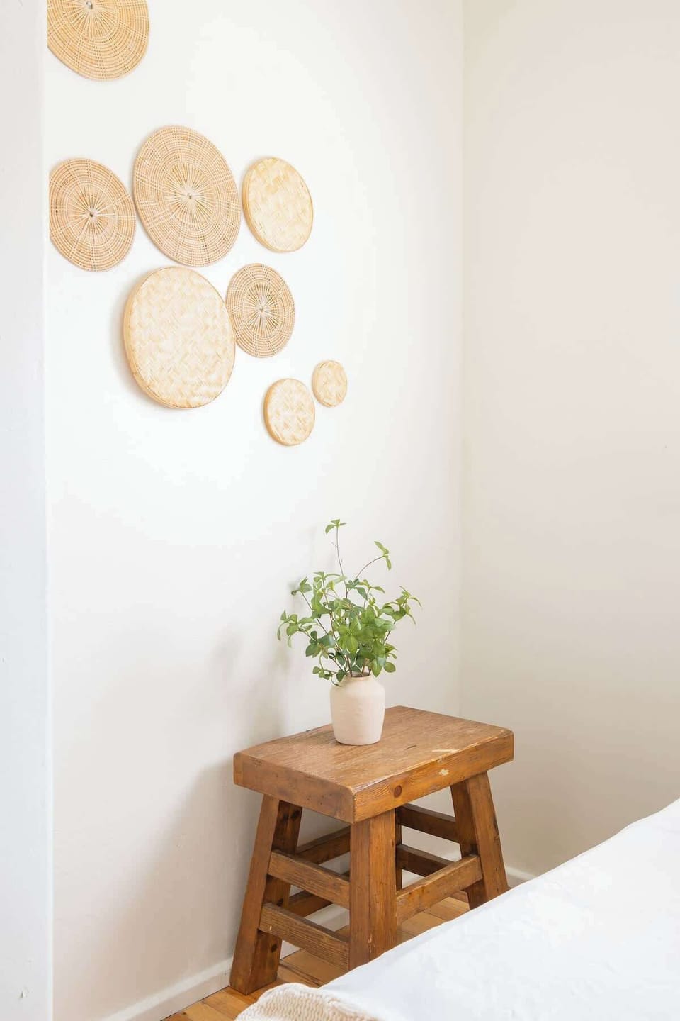 Keep your book and devices handy with a chic side table by the bed 