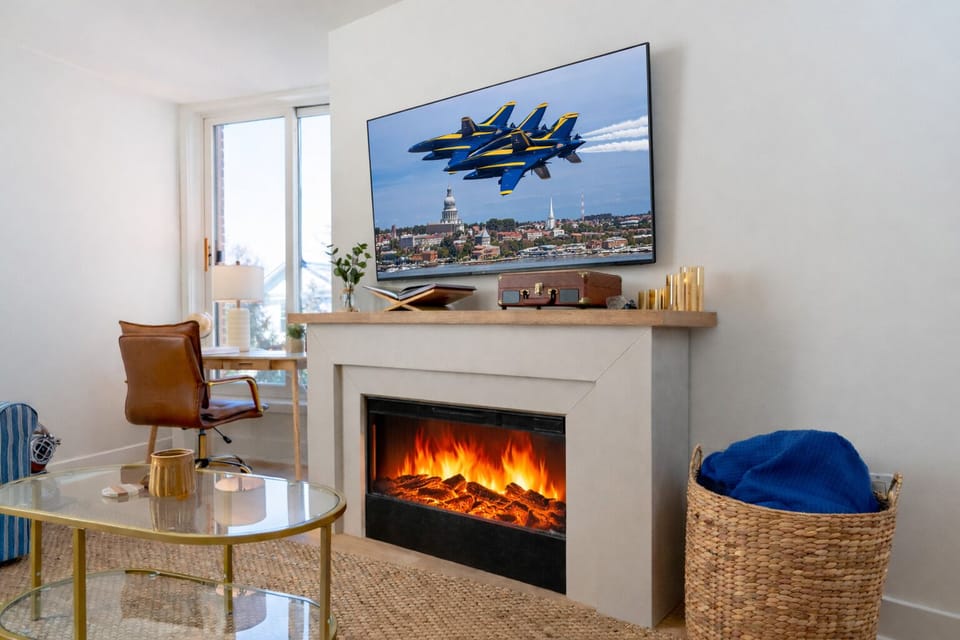 Cozy coastal living with an electric fireplace and smart TV — the perfect place to unwind after exploring Annapolis