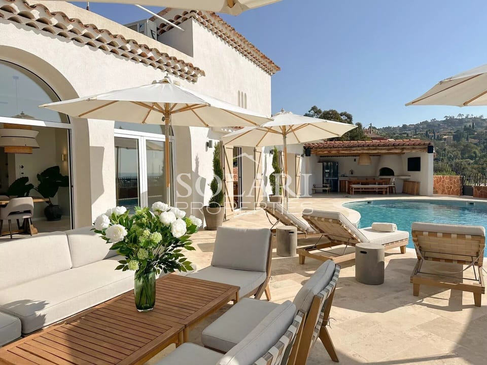 Pool area with lounges