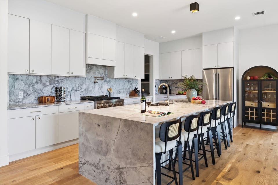 Stunning marble kitchen with bar seating