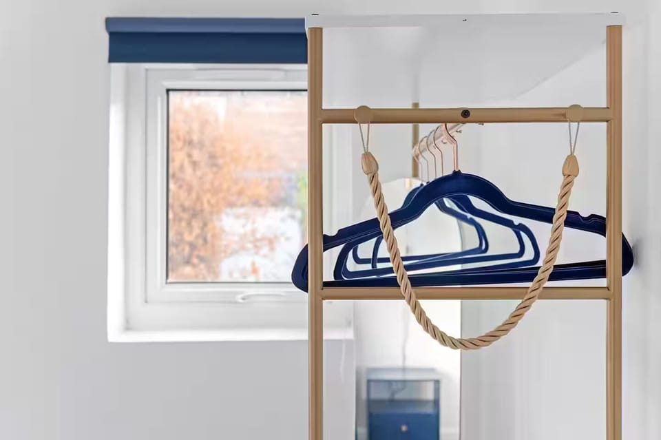 Bedroom 1 , bedroom interior hanging rack . 