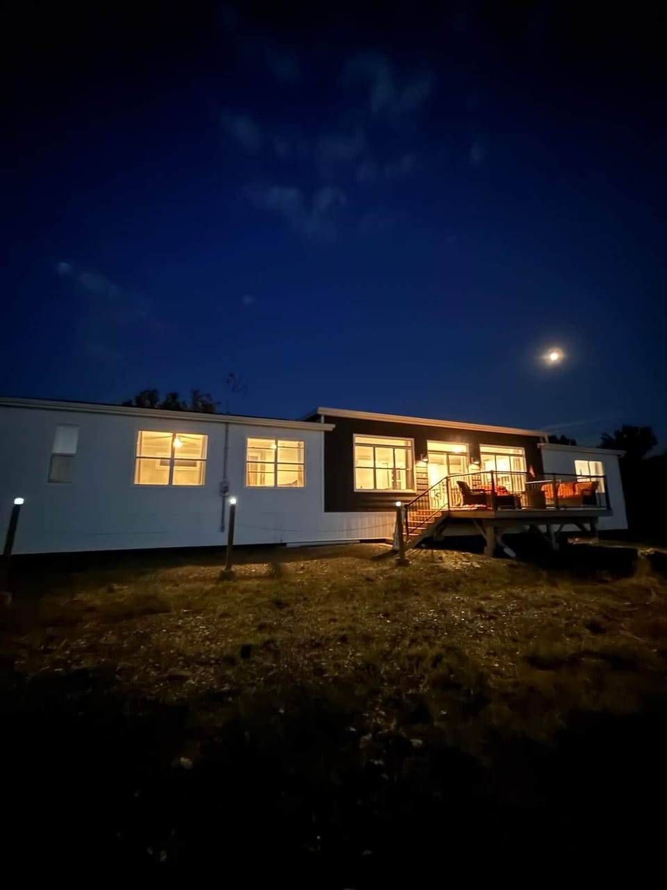 Outdoor front- exterior home at night. 