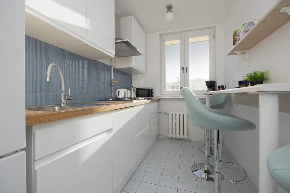 The kitchen's modern appliances make meal preparation easy.