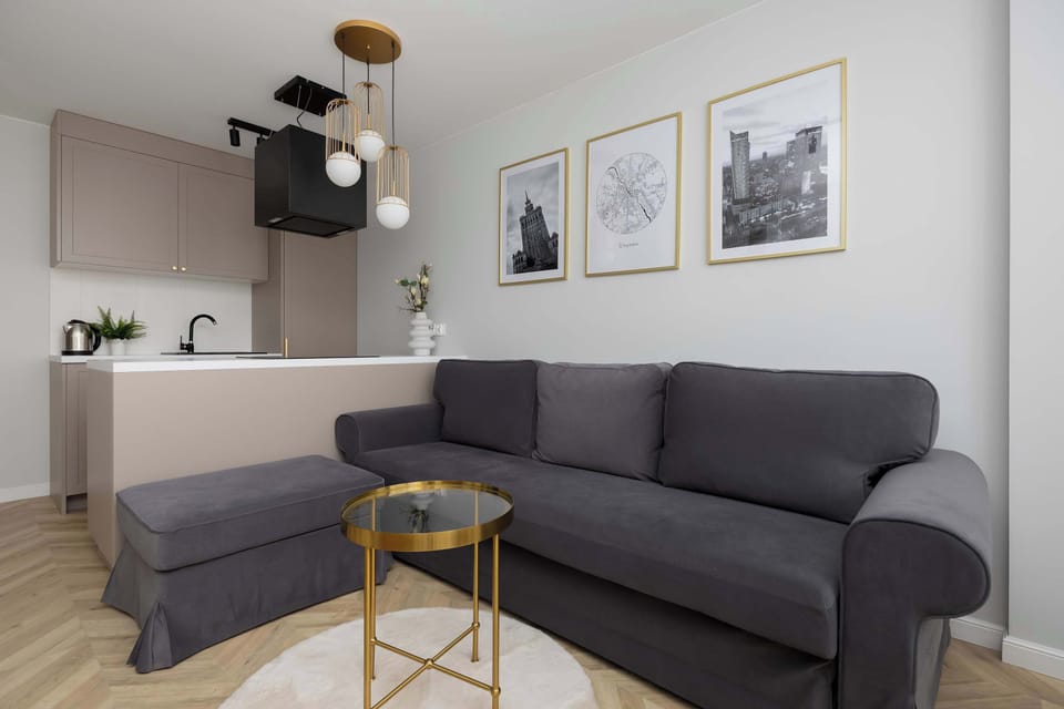 Living room with sofa and accent table.