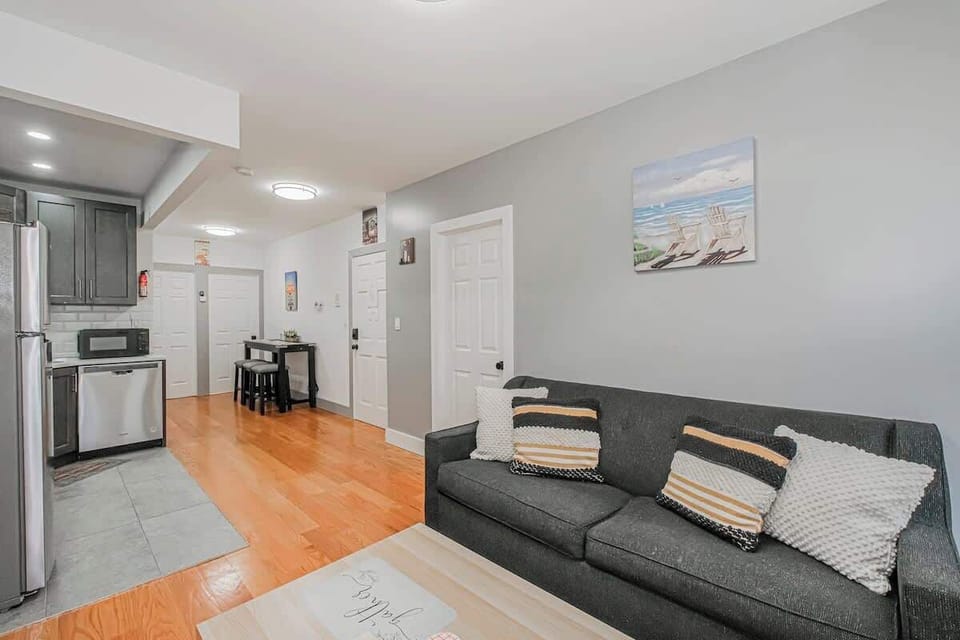 A panoramic view of the living room with elegant seating.