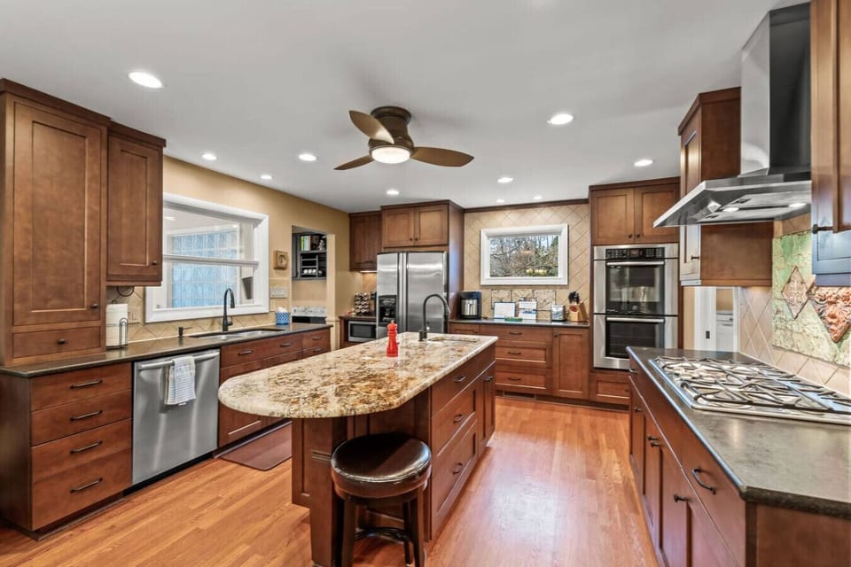 Fully stocked kitchen for your family to enjoy during your stay. Double ovens and gas stove top.