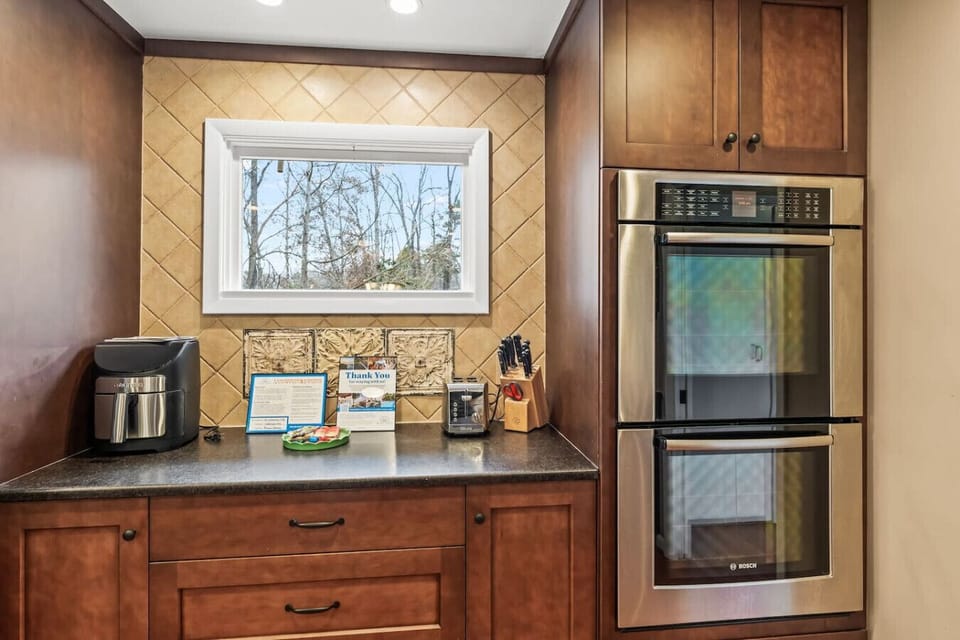 Fully stocked kitchen for your family to enjoy during your stay. Double ovens and gas stove top.