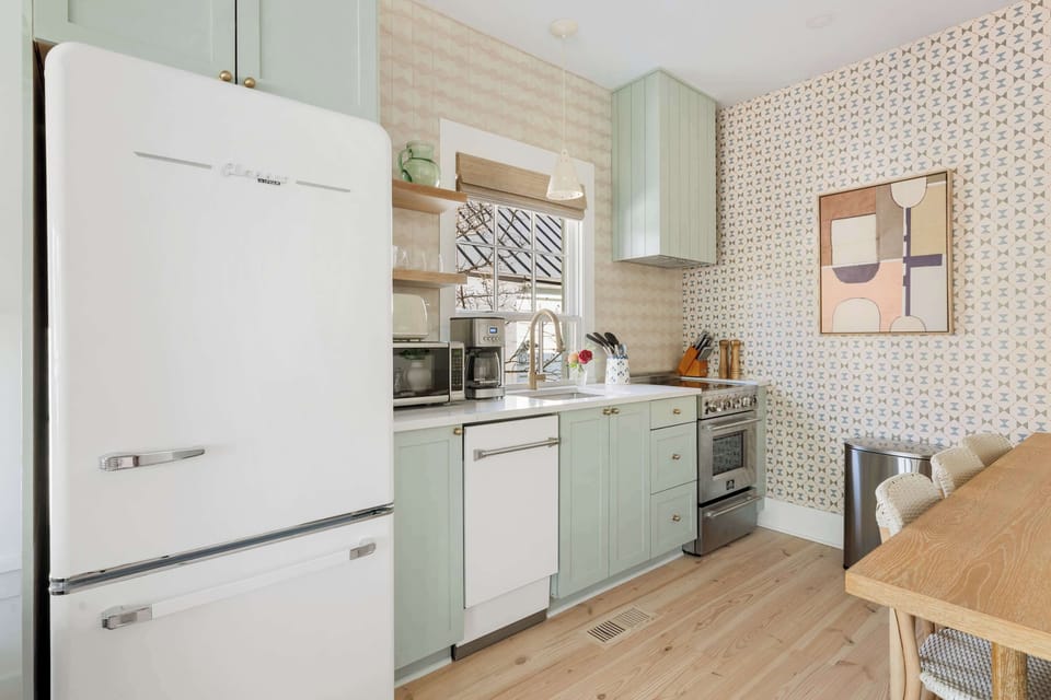 Fully equipped kitchen with dining seating area 