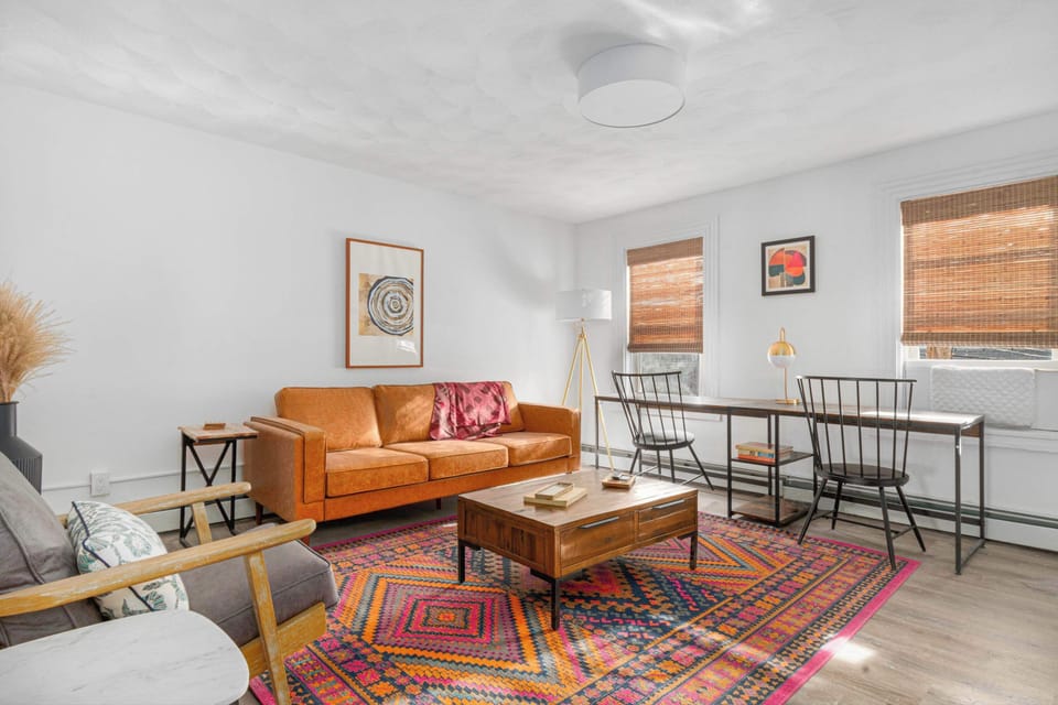(2W) Where comfort meets cool. This is more than just a living room; it's the heart of your home away from home.