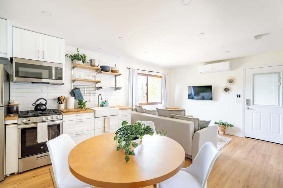 Eat together in the dining space with a table set for four