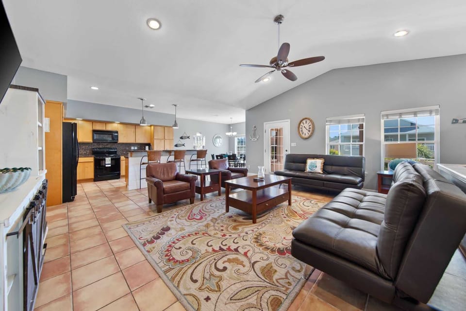 Open-concept living flows easily into the kitchen and dining