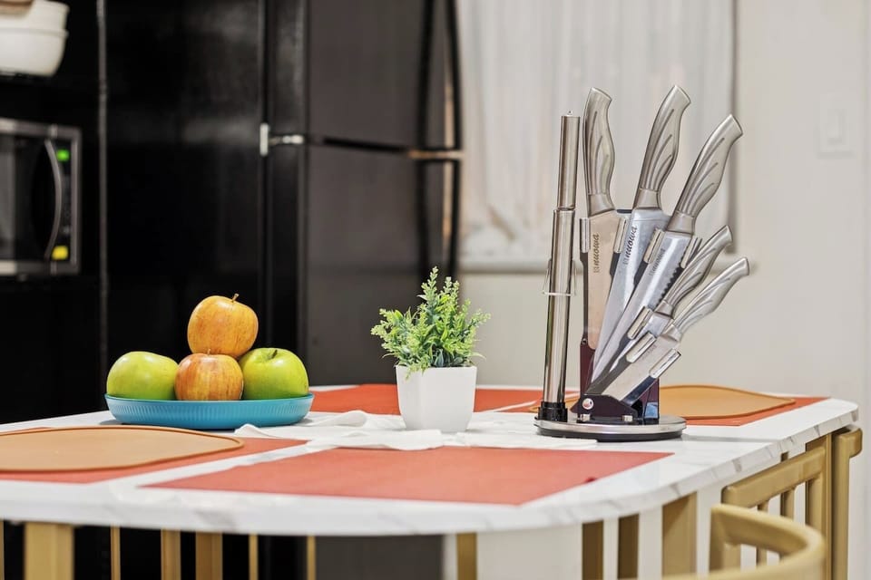 Full kitchen with full‑size appliances, cookware, dishes, and everything needed for long‑term stays and daily cooking.