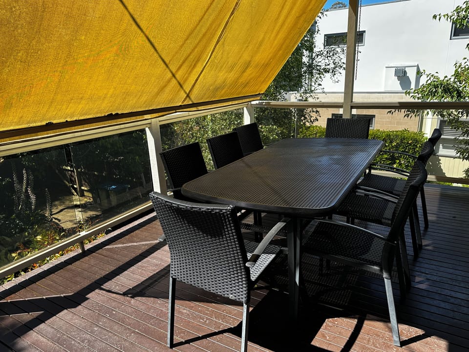 Upstairs patio with dining table