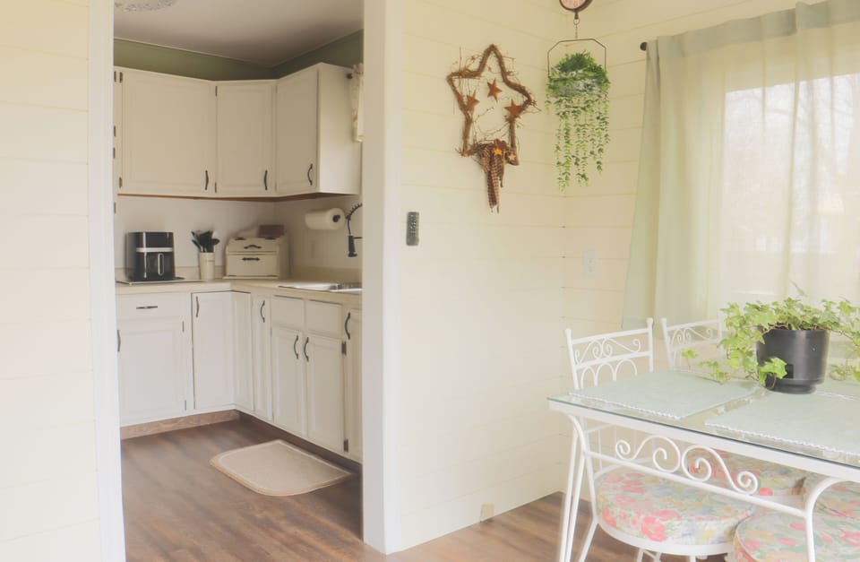 Sitting area leading into kitchen