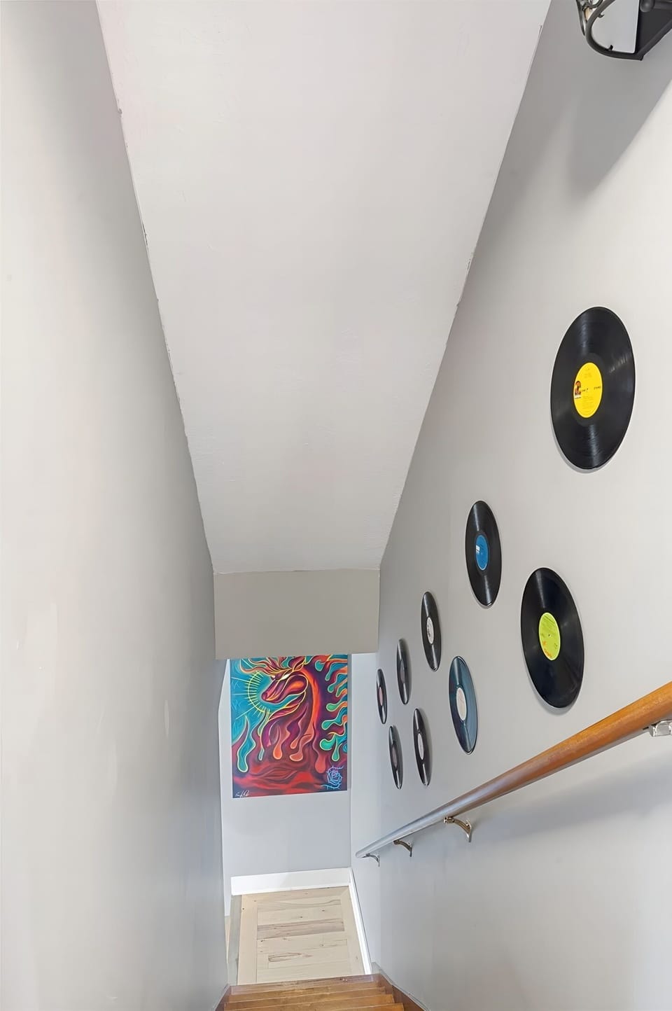 Rock on with cool vinyl decor as you head down the stairs.