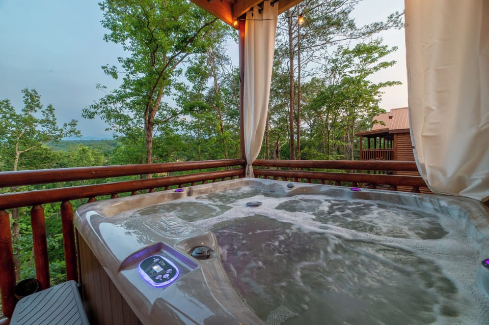 Relax and unwind in the private hot tub, surrounded by the peaceful cabin setting. Perfect for soaking under the stars after a day of adventure, it’s the ideal spot to recharge and enjoy the mountain atmosphere.
