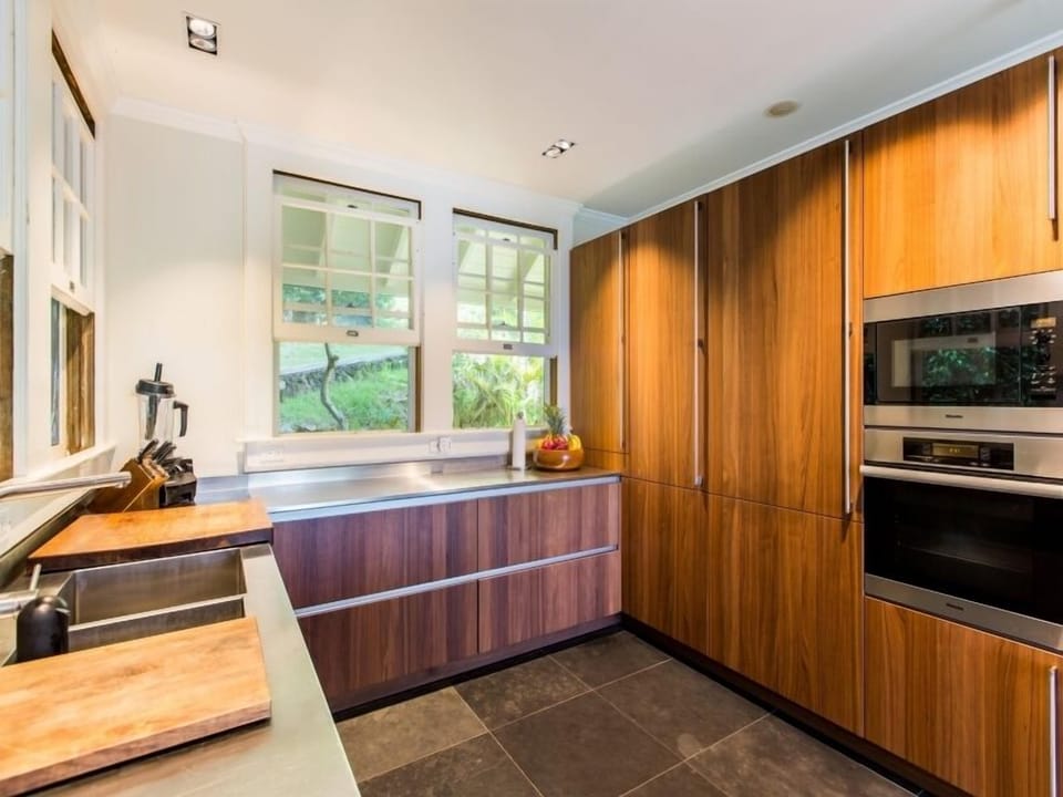 Sleek SieMatic cabinetry and modern appliances in a thoughtfully refreshed kitchen.