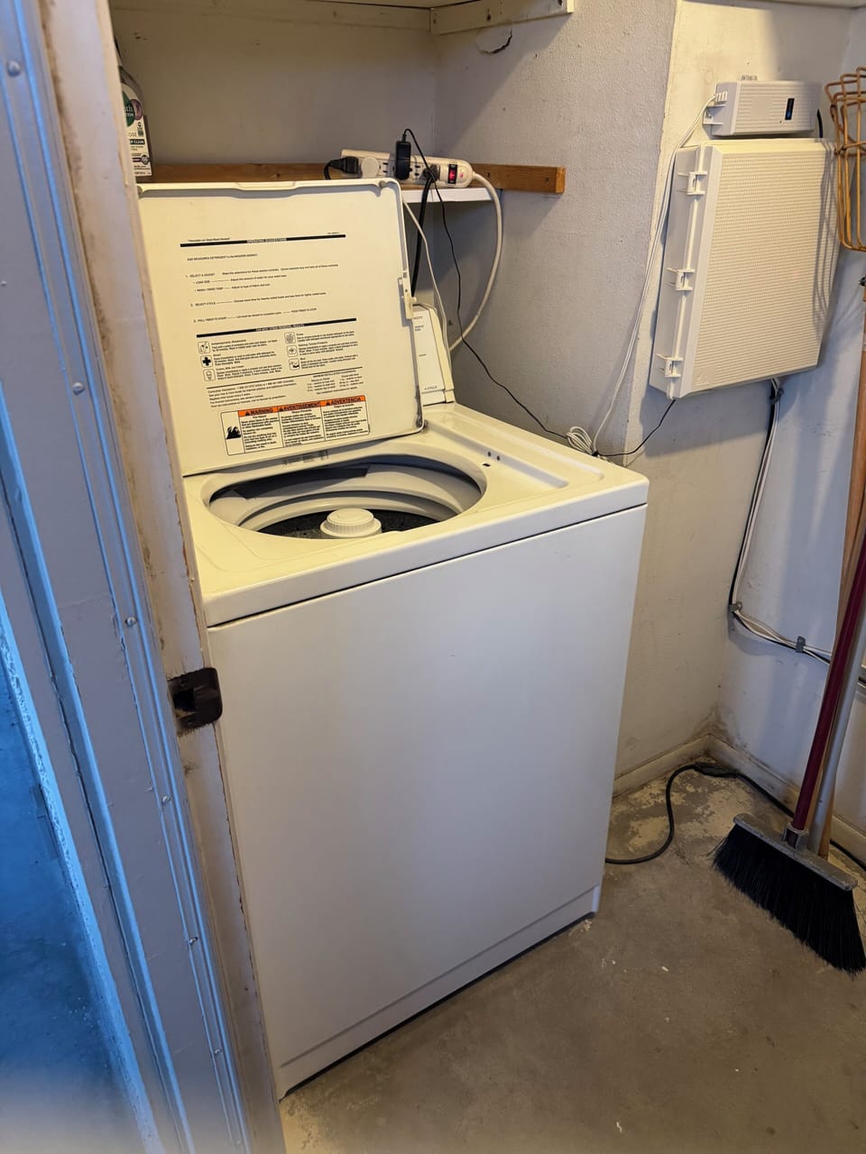 Washer & dryer in closet, accessed outside in the carport.