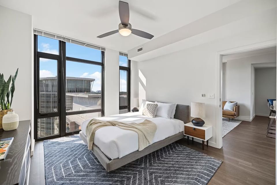 Wake up to sunshine and sweeping views from the plush bed.