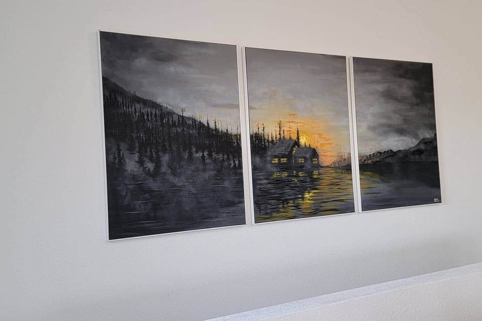 Customized theme based paintings made by a local artist. The scenery depicts the confluence of the lake, houses, and mountains. You can see a similar view during sunset.