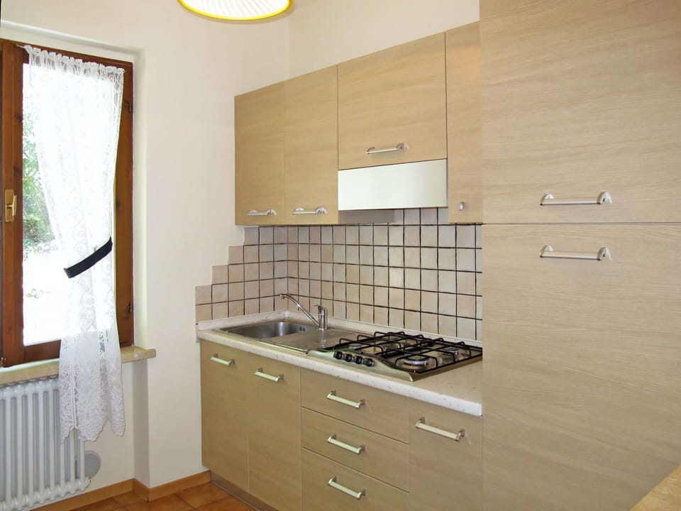Kitchen, Wood, Countertop, Flooring, Cabinetry, Kitchen Appliance, Major Appliance, Interior Design, Floor, Kitchen Sink
