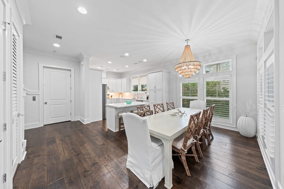 The heart of the home. An open-concept kitchen, dining, and living area designed for gathering, featuring a fully equipped kitchen and light-filled spaces. Perfect for slow mornings, shared meals, and easy evenings together after the beach.