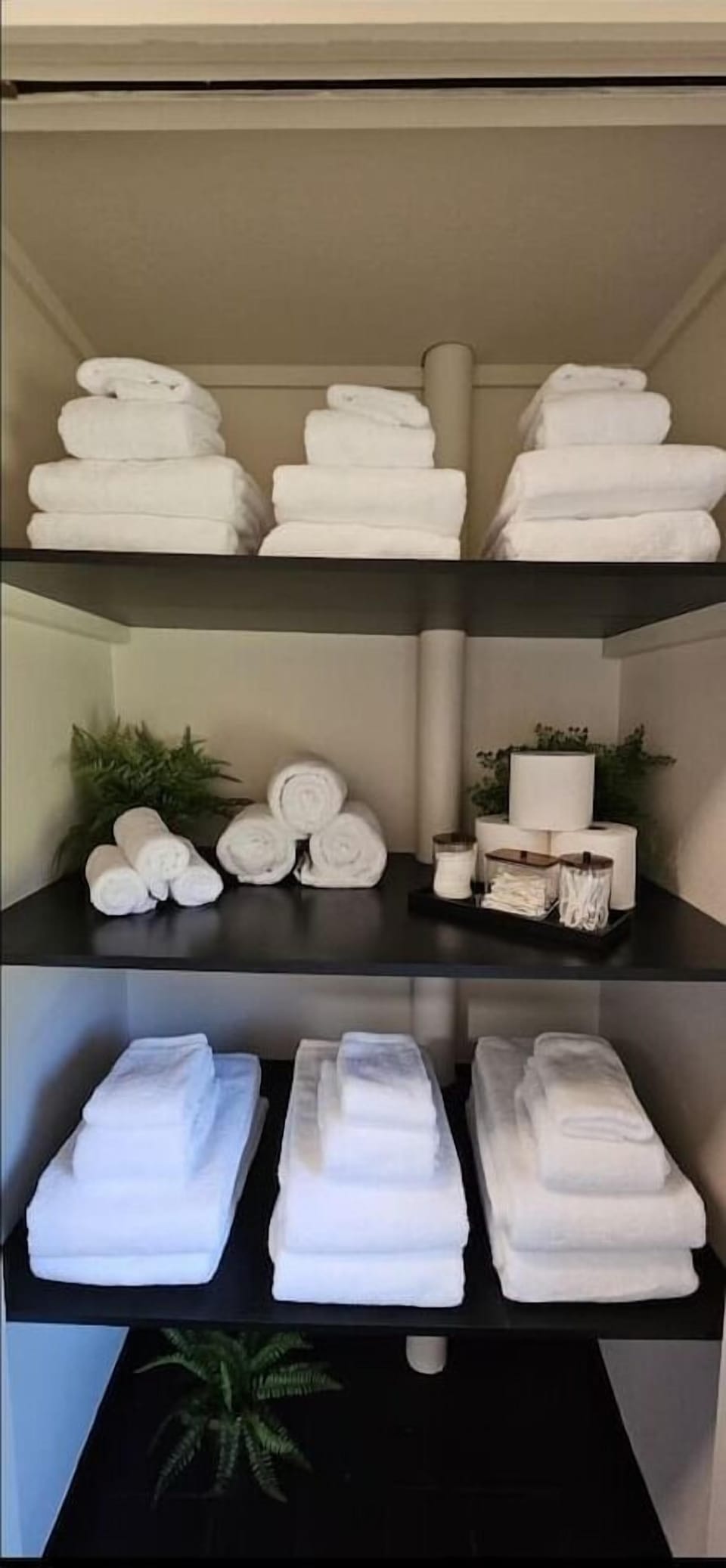 Bright, freshly updated bathroom showcasing a walk‑in shower, quality amenities, and spa‑inspired atmosphere.