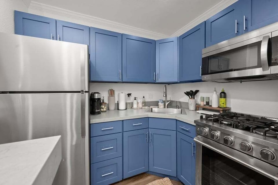 Fully stocked kitchen with fridge, cooking and baking supplies and Nespresso.