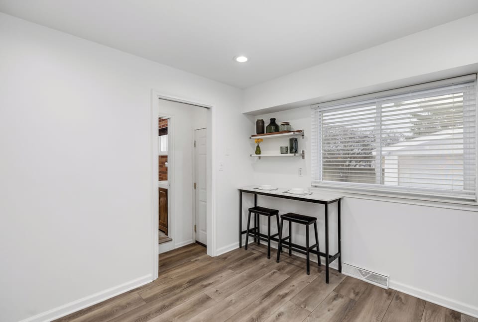 Start your morning at this sunny breakfast nook, perfect for sipping coffee or planning the day. This high-top table also doubles as a dedicated workspace with fast WiFi, making it easy to handle remote work needs.