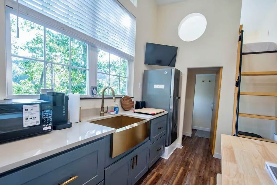 Hugh window looking at the lake, nice kitchen farm sink