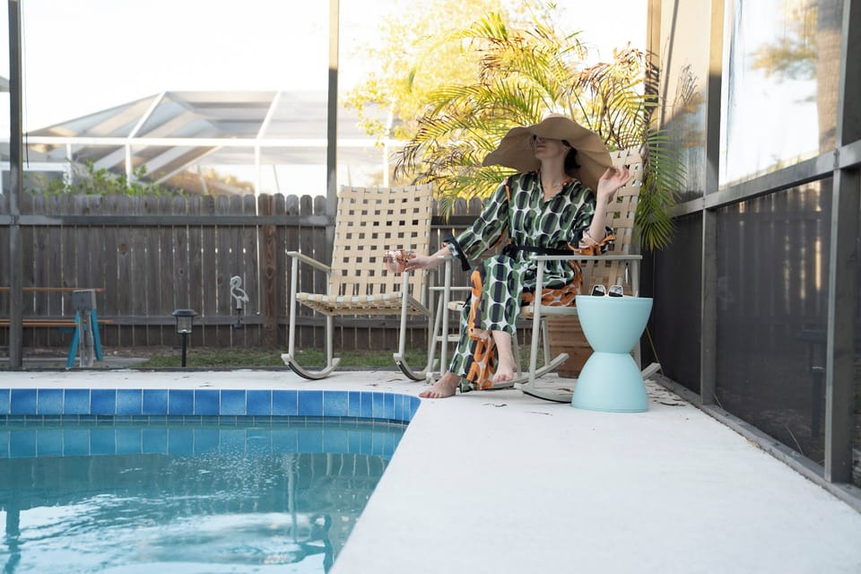 Private screened pool with chic loungers—perfect for morning coffee or sunset sips