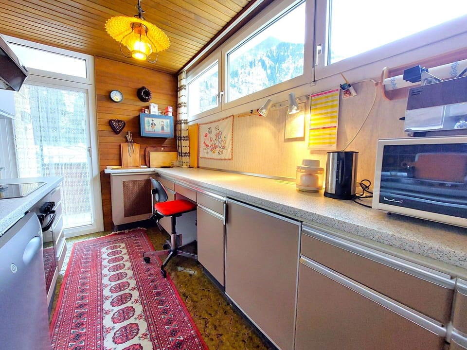 Kitchen, Interior Design, Countertop, Flooring, Wood, Furniture, Major Appliance, Kitchen Appliance, Cabinetry, Floor