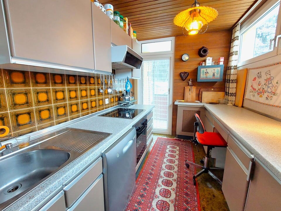 Kitchen, Wood, Major Appliance, Countertop, Interior Design, Flooring, Kitchen Appliance, Furniture, Cabinetry, Floor