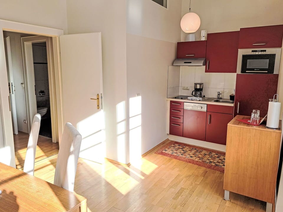 Flooring, Floor, Interior Design, Wood, Furniture, Room, Apartment, Major Appliance, Ceiling, Cabinetry