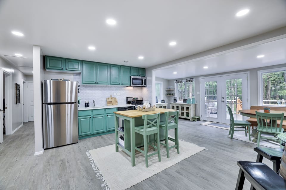 Open concept kitchen area with plenty of seating areas.